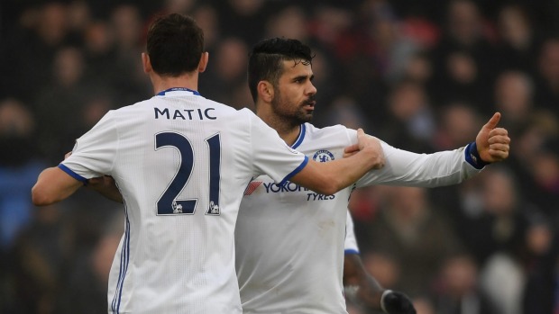 TONY O'BRIEN  REUTERS 
 
   Diego Costa celebrates scoring Chelsea's match-winning goal against Crystal Palace with Nemanja Matic