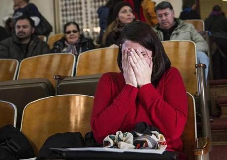 Anne Devlin from Plano Texas cried after the Electoral College voted at the state Capitol in Austin on Monday