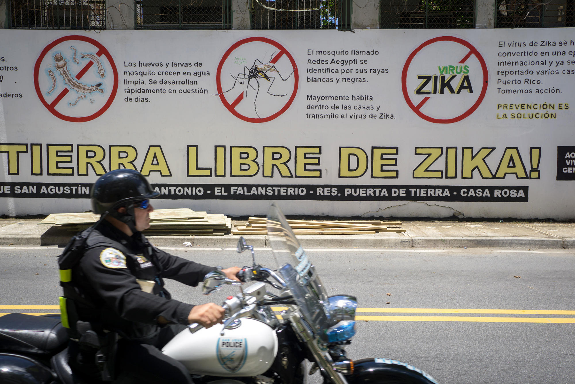 Anti-Zika advice applied to a wall in front of a housing project in the Puerta de Tierras section of San Juan Puerto Rico. This public health message was part of an island-wide effort to stem the spread of Zika