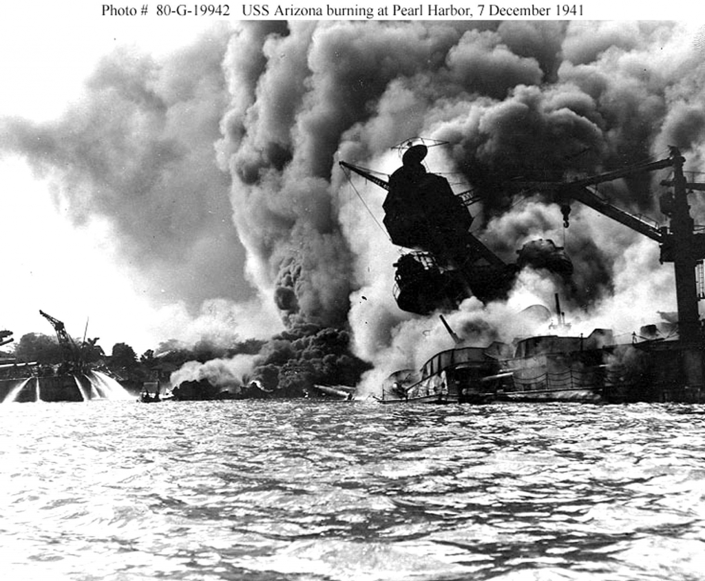 The USS Arizona burns during the bombing of Pearl Harbor