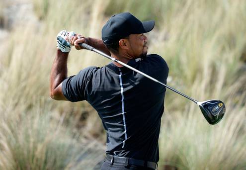 Tiger Woods in action on Thursday