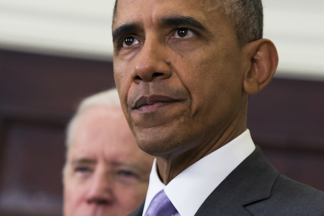 Vice President Joe Biden listens at left as President Barack Obama speaks about the Islamic State group in the Roo