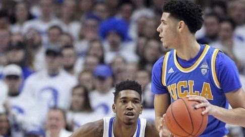 UCLA's Lonzo Ball works against Kentucky's Malik Monk in Saturday's 97-92 win