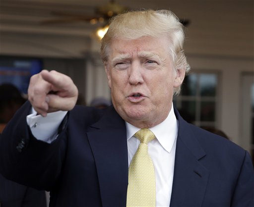 Republican presidential candidate Donald Trump arrives to a fundraising event at a golf course in the Bronx borough of New York Monday