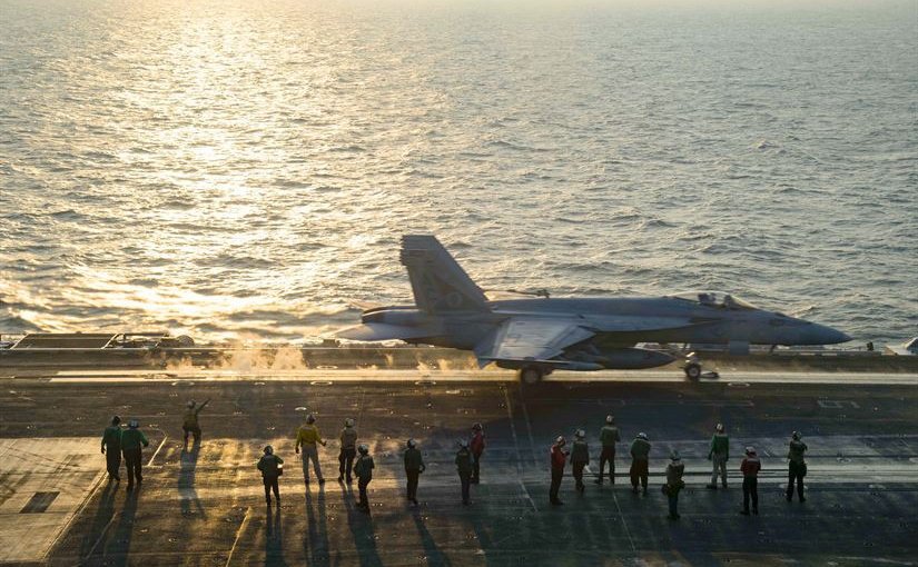 An F  A-18E Super Hornet assigned to the Gunslingers of Strike Fighter Squadron 105 launches from the flight deck of the aircraft carrier USS Dwight D. Eisenhower . Ike and its Carrier Strike Group are deployed in support of Operation I