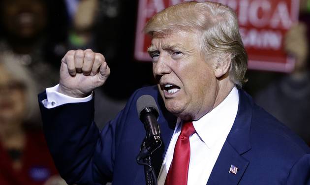 President-elect Donald Trump speaks to supporters during a rally in Fayetteville N.C. Trump’s promise to “work something out” for immigrants brought here illegally as kids is dividing fellow Republicans underscoring