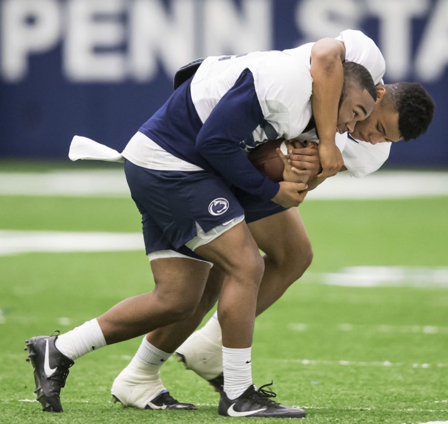 Penn State running backs Saquon Barkley and Miles Sanders work on a drill this week during practice