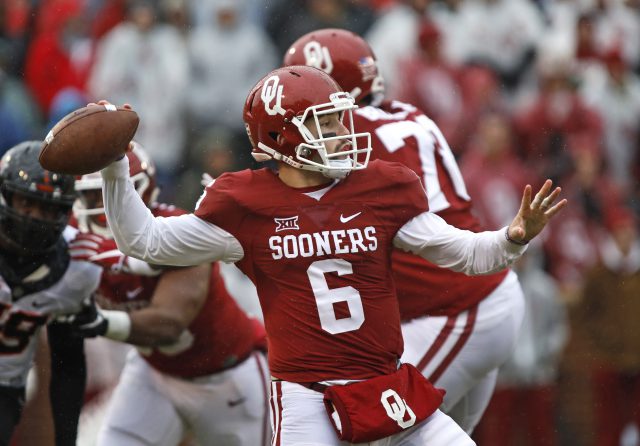 NORMAN OK- DECEMBER 3 Quarterback Baker Mayfield #6 of the Oklahoma Sooners looks to throw against the Oklahoma State Cowboys