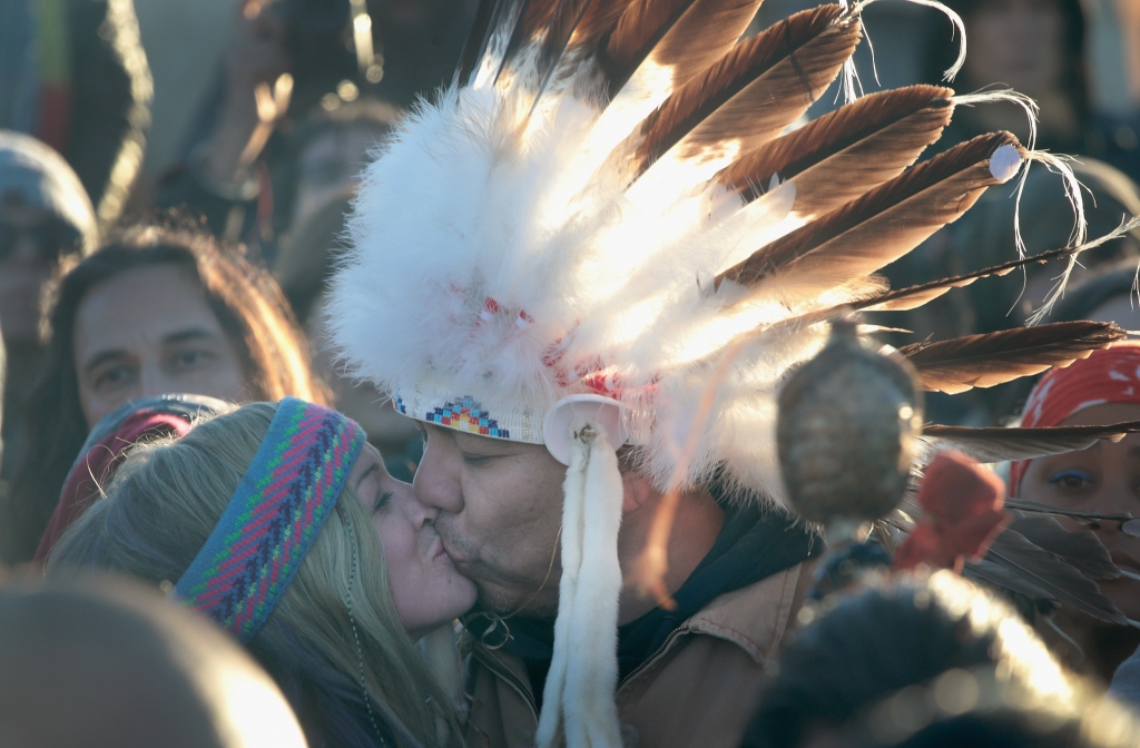 CANNON BALL ND- DECEMBER 04 Native American and other activists celebrate after learning an easement had been denied for the Dakota Access Pipeline at Oceti Sakowin Camp on the edge of the Standing Rock Sioux Reservation