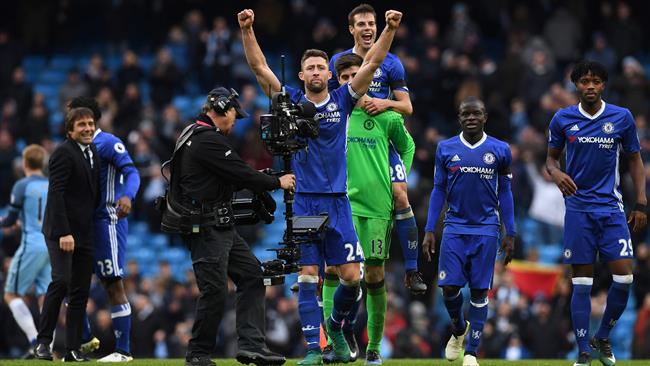 Chelsea's English defender Gary Cahill celebrates at the end of the English Premier League football match between Manchester City and Chelsea at the Etihad Stadium in Manchester north west England