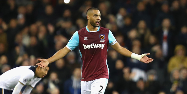 Winston Reid protests his dismissal from the English Premier League match between Tottenham Hotspur and West Ham United