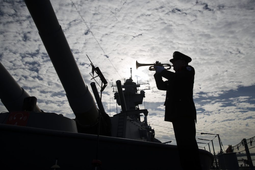 Greg Murphy plays the Navy Hymn during a ceremony commemorating the 75th anniversary of the Dec. 7 1941 Japanese attack on Pearl Harbor on board The Battleship New Jersey Museum and Memorial in Camden N.J. Wednesday Dec. 7 2016. (Matt Rourke  AP Phot