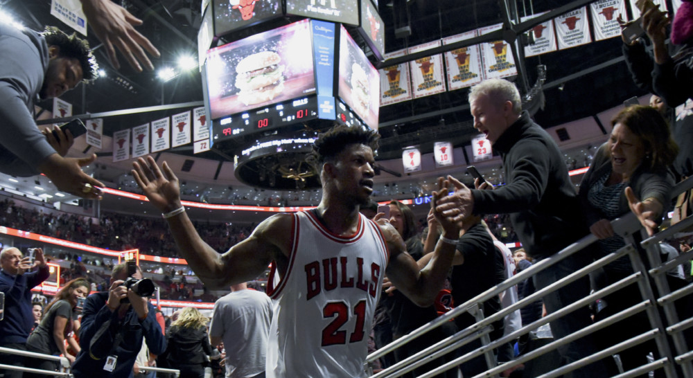 Chicago Bulls forward Jimmy Butler greets fans after an NBA basketball game against the Brooklyn Nets on Wednesday Dec. 28 2016 in Chicago. Chicago won 101-99