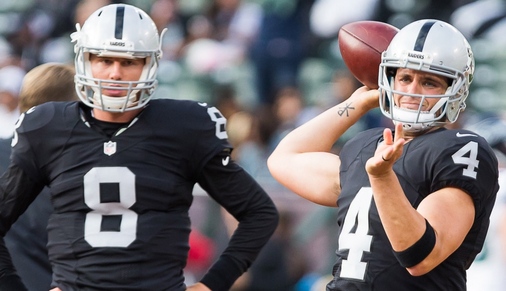 Sep 1 2016 Oakland CA USA Oakland Raiders quarterback Derek Carr throws the ball ahead of quarterback Connor Cook before the game Seattle Seahawks at Oakland Coliseum. Mandatory Credit Kelley L Cox-USA TODAY Sports