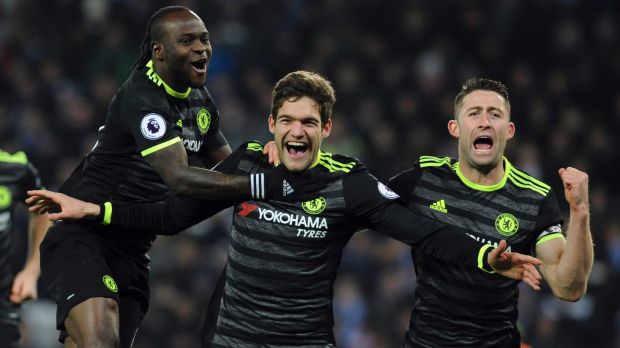 Surprise star Chelsea's Marcos Alonso celebrates one his two goals against Leicester