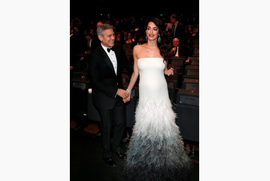 Actor George Clooney and Amal Clooney arrive at the 42nd Cesar Film Awards ceremony at Salle Pleyel in Paris Friday Feb. 24 2017. This annual ceremony is presented by the French Academy of Cinema Arts and Techniques