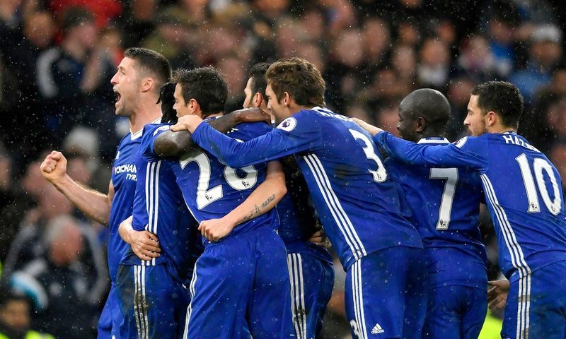 Chelsea players celebrating after a goal was scored