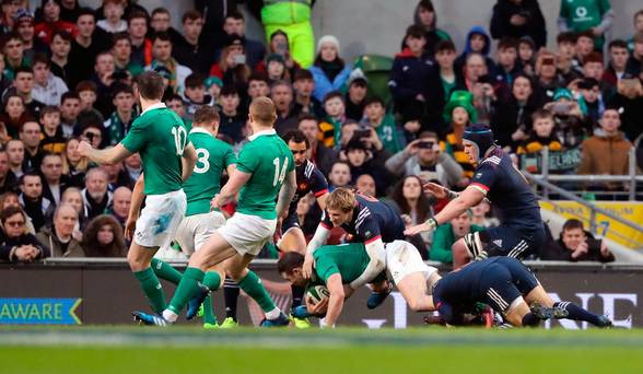 Ireland's Conor Murray scores the game's sole try during the RBS 6 Nations match at the Aviva Stadium Dublin on Saturday