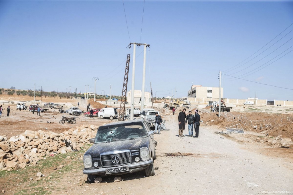 People gather after a car bomb attack by the Daesh terrorist group killing at least 35 people in northern Syria's strategic Al Bab area on 24th February 2017