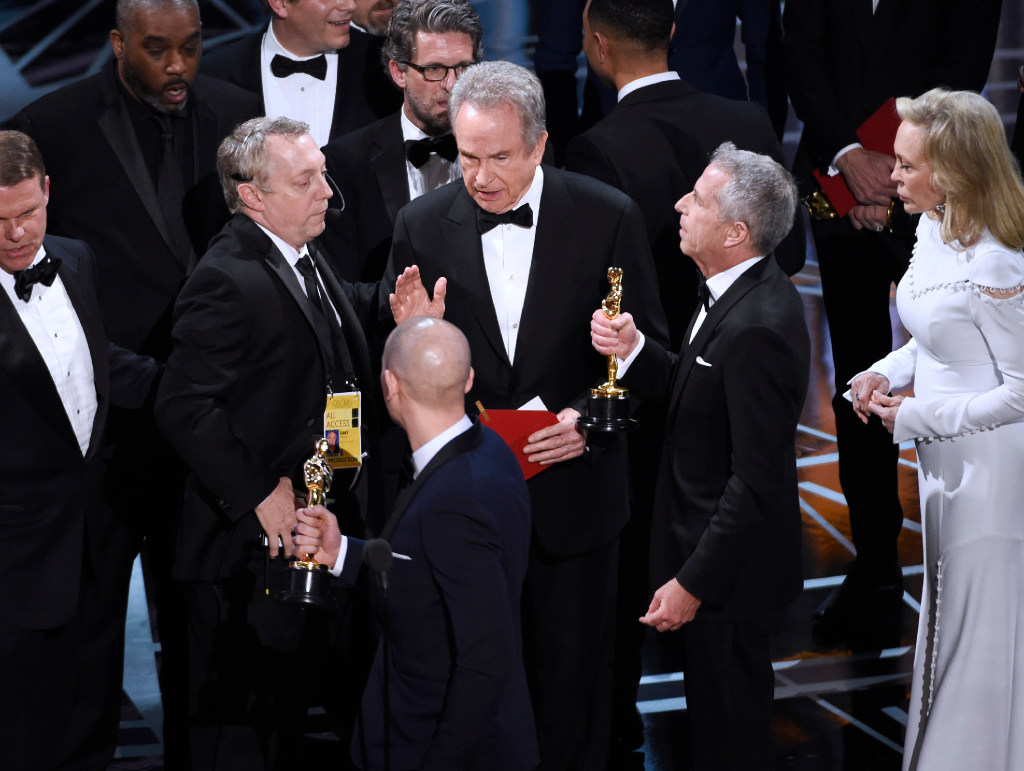 Arts and Sciences officials and producers from'La La Land at the Oscars on Sunday. Chris Pizzello  Invision  AP