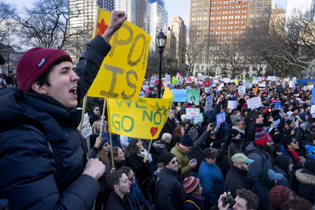 Protesters demonstrate against Trump's immigration order in New York City on Sunday. AP