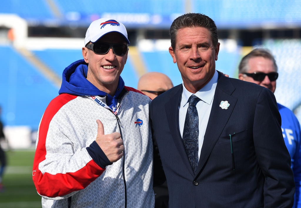 ORCHARD PARK NY- NOVEMBER 08 Former NF L quarterbacks Jim Kelly and Dan Marino pose for