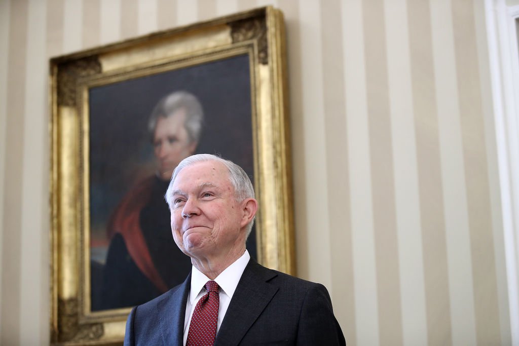 Jeff Sessions listens as President Donald Trump introduces him prior to being sworn in as the new U.S. Attorney General in the Oval Office of the White House