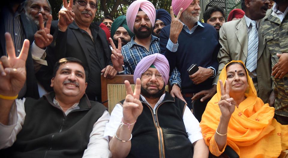 Captain Amarinder Singh with Congress leaders at his residence in Chandigarh on Saturday