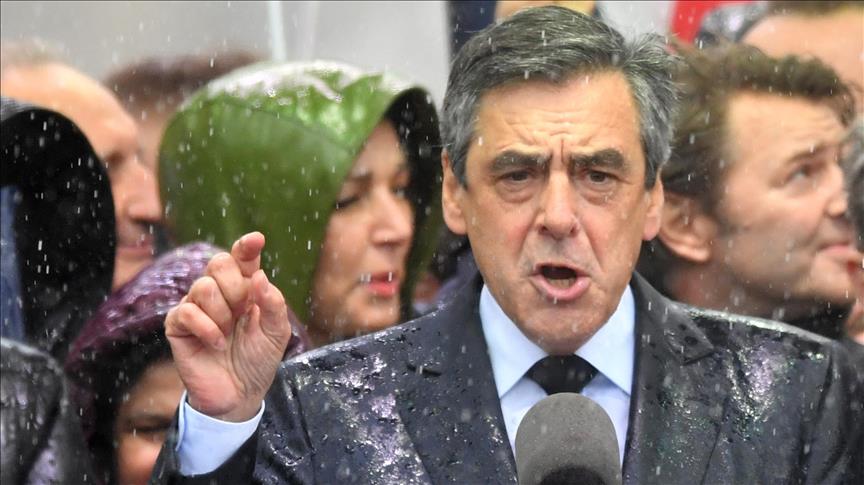 French candidate Fillon says he will remain in race