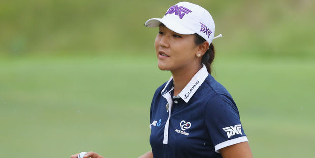 Lydia Ko of New Zealand makes birdie on the eighth hole during the third round