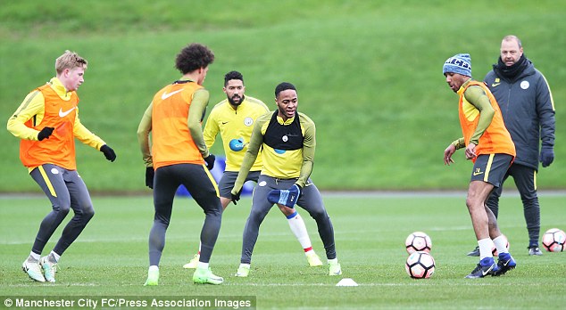 Manchester City's stars trained at their City Academy base on Monday