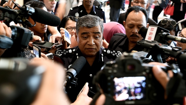 Khalid Abu Bakar chief of the Royal Malaysian Police speaks to members of the media on Thursday. Interpol has issued an international arrest warrant for four North Koreans wanted by Malaysian investigators in connection with the assassination of Kim Jon