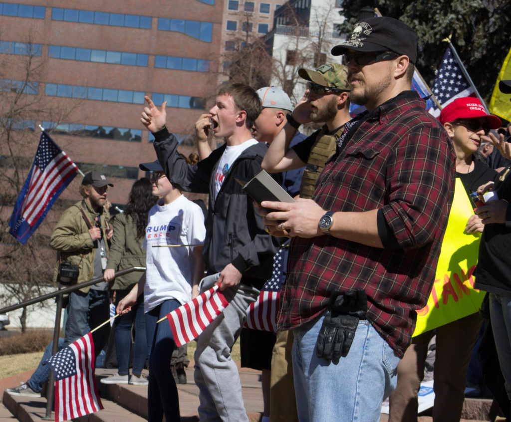 Participants of the March 4 Trump rally shout at anti Trump protesters who showed up to the event