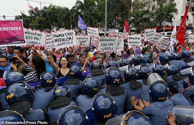 Manila Philippines. Women all over the world mark the women's day with rallies and protests to highlight the role of women in society. (AP