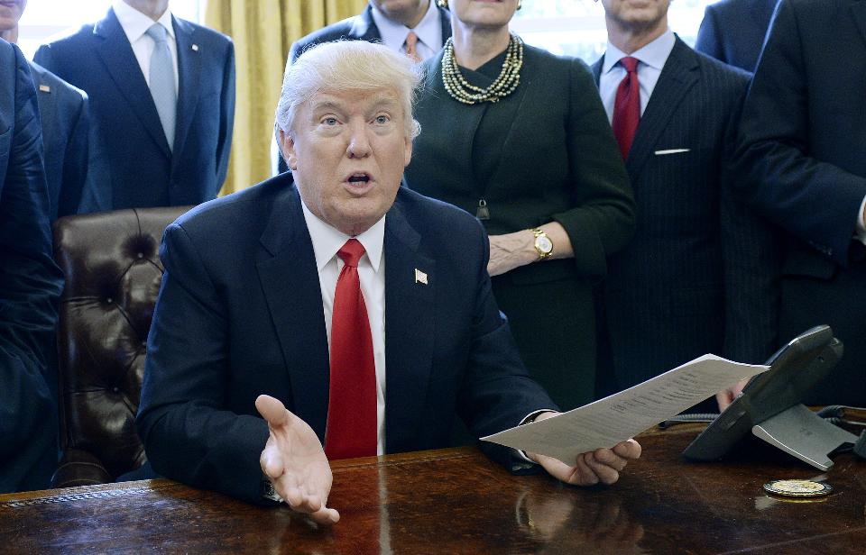 President Donald Trump signs an executive order last month