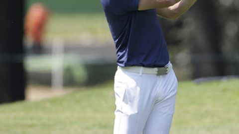 Dustin Johnson of the U.S. plays a shot on the 10th hole in round one of the Mexico Championship at Chapultepec Golf Club in Mexico City Thursday