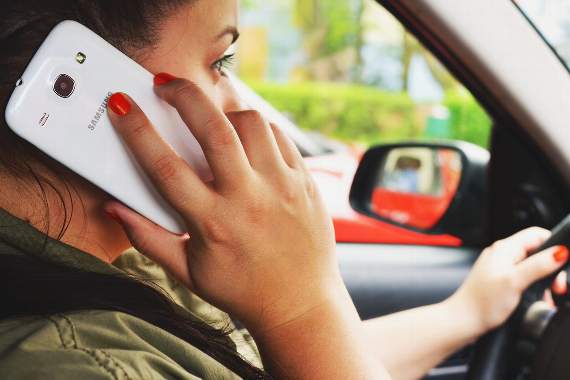 The penalties for using a mobile phone while driving doubled yesterday