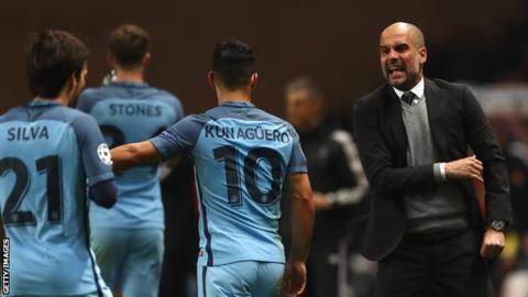 Pep Guardiola gives instructions to his players