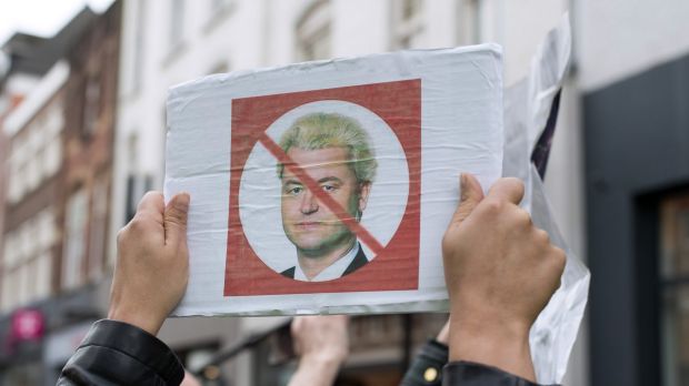 A protester shows his opposition to far-right Dutch politician Geert Wilders as he campaigns in Heerlen