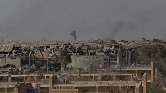 Smoke rises over western Mosul amid fighting between Iraqi government forces and Islamic State extremists