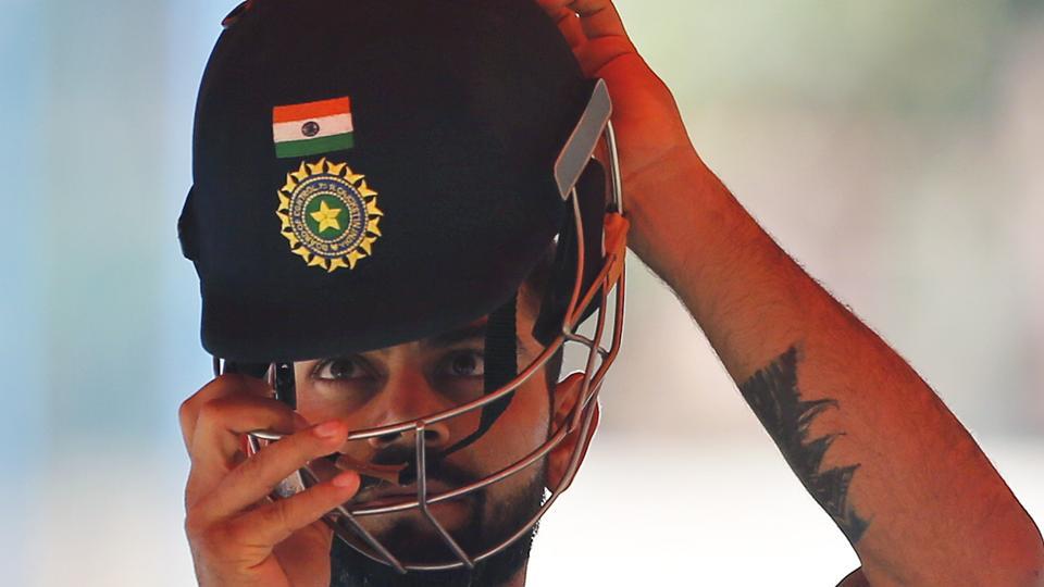 Virat Kohli prepares to bat in the nets during a training session ahead of their second cricket Test match against Australia in Bangalore