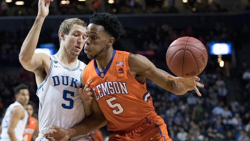 Dukes Luke Kennard left guards Clemson forward Jaron Blossomgame on Wednesday at the ACC Tournament