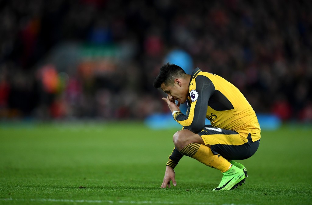 LIVERPOOL ENGLAND- MARCH 04 Alexis Sanchez of Arsenal looks dejected during the Premier League match between Liverpool and Arsenal at Anfield