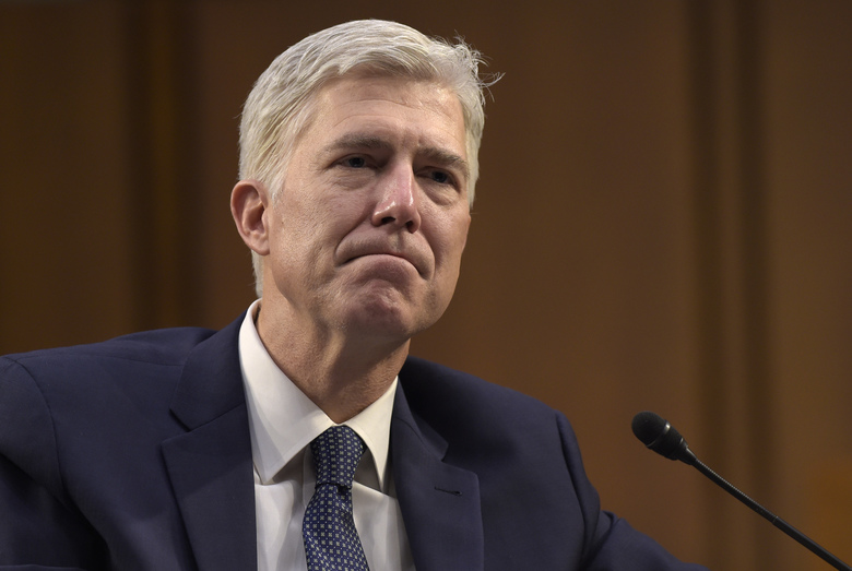 Supreme Court Justice nominee Neil Gorsuch listens as he is asked a question by Sen. Mazie Hirono D-Hawaii on Capitol Hill in Washington during his confirmation hearing before the Senate Judiciary