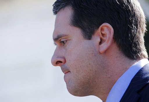 House Intelligence Committee Chairman Rep. Devin Nunes R-Calif. pauses while speaking with reporters outside the White House in Washington Wednesday