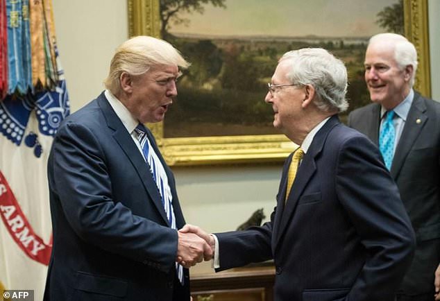 US President Donald Trump shown shaking hands with Senate Majority Leader Mitch McConnell has always had a rocky relationship with the Republican Party establishment