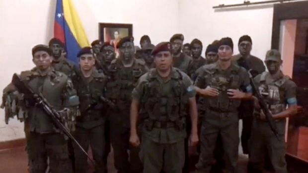 A TV grab taken from a video posted on social media of dissident military officials attempting an uprising at a barracks in Venezuela