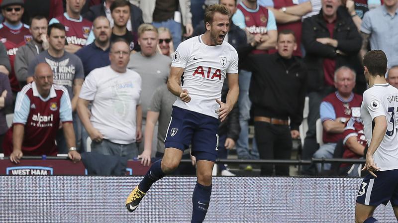 Dele Ali and Harry Kane celebrate Tottenham's first goal against West Ham United