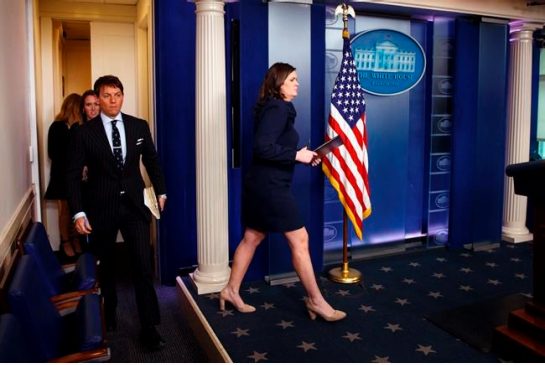 White House press secretary Sarah Huckabee Sanders arrives for the daily press briefing at the White House Monday Jan. 22 2018 in Washington