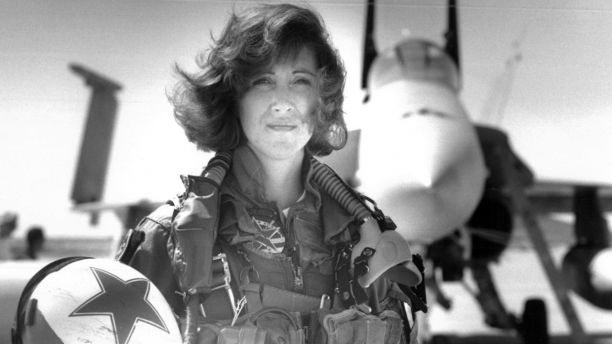 In this image provided by the U.S. Navy Lt. Tammie Jo Shults one of the first women to fly Navy tactical aircraft poses in front of an F  A-18A with Tactical Electronics Warfare Squadron 34 in 1992. After leaving active duty in early 1993 Shults